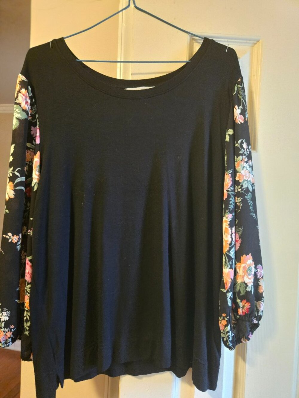 Counterparts L top, black bodice with floral sheer sleeves